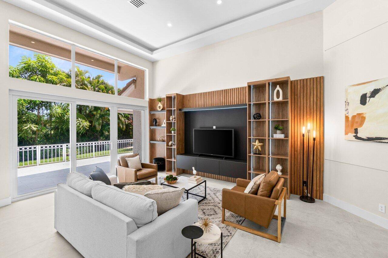 Stunning one story townhome in the Windsor Parke section of The Polo Club.