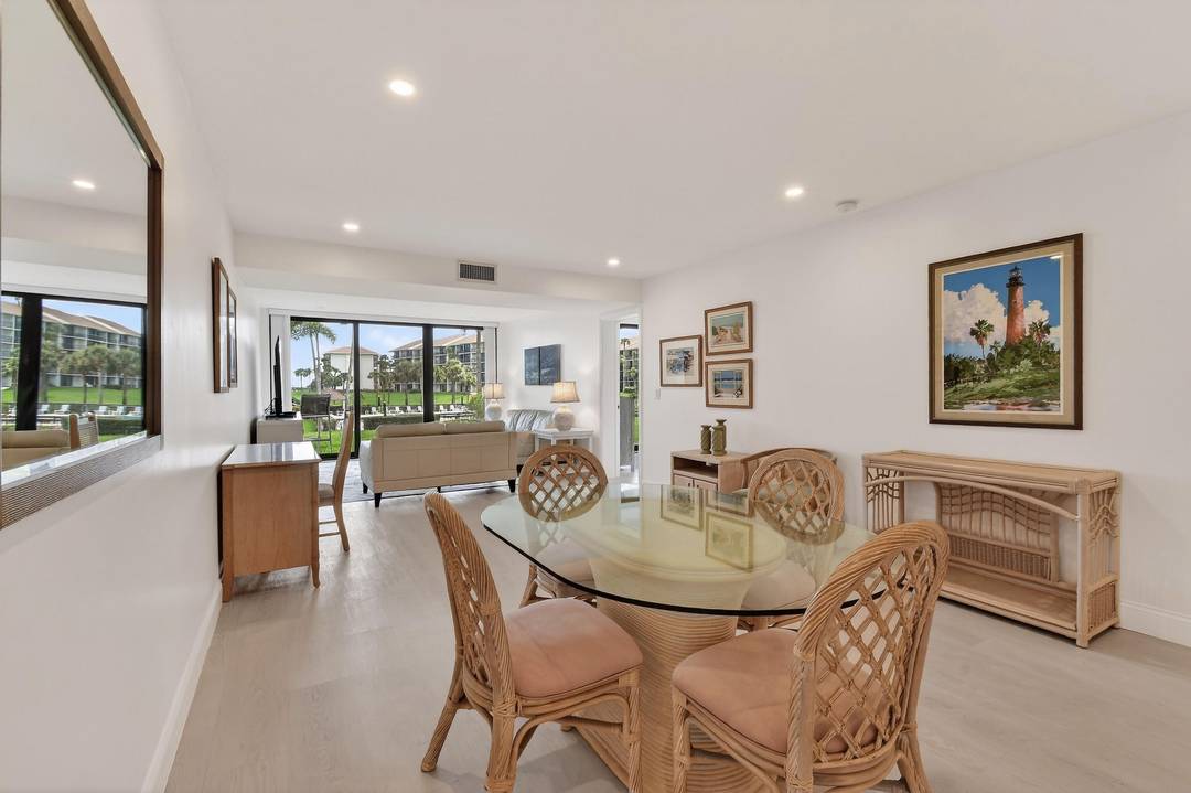 Experience the best of coastal living in this rarely available ground level walk out residence in the highly sought after Bluffs South, a gated oceanfront community.