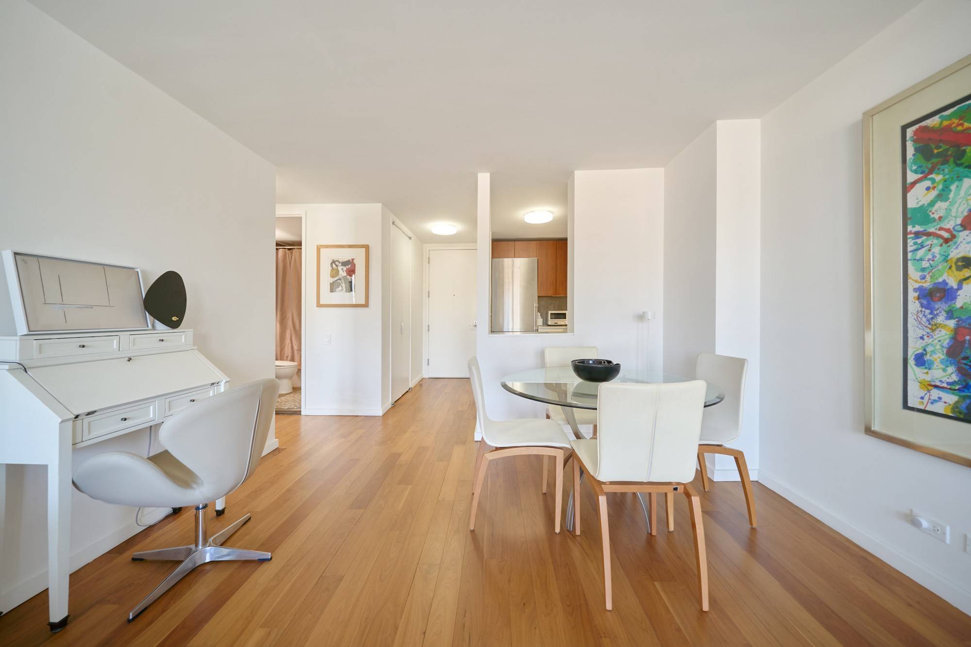 Apartment 9N is a spacious, generously proportioned North facing one bedroom with a King sized bedroom, exceptional closet space, beautiful natural walnut floors, a custom kitchen with walnut and lacquered ...