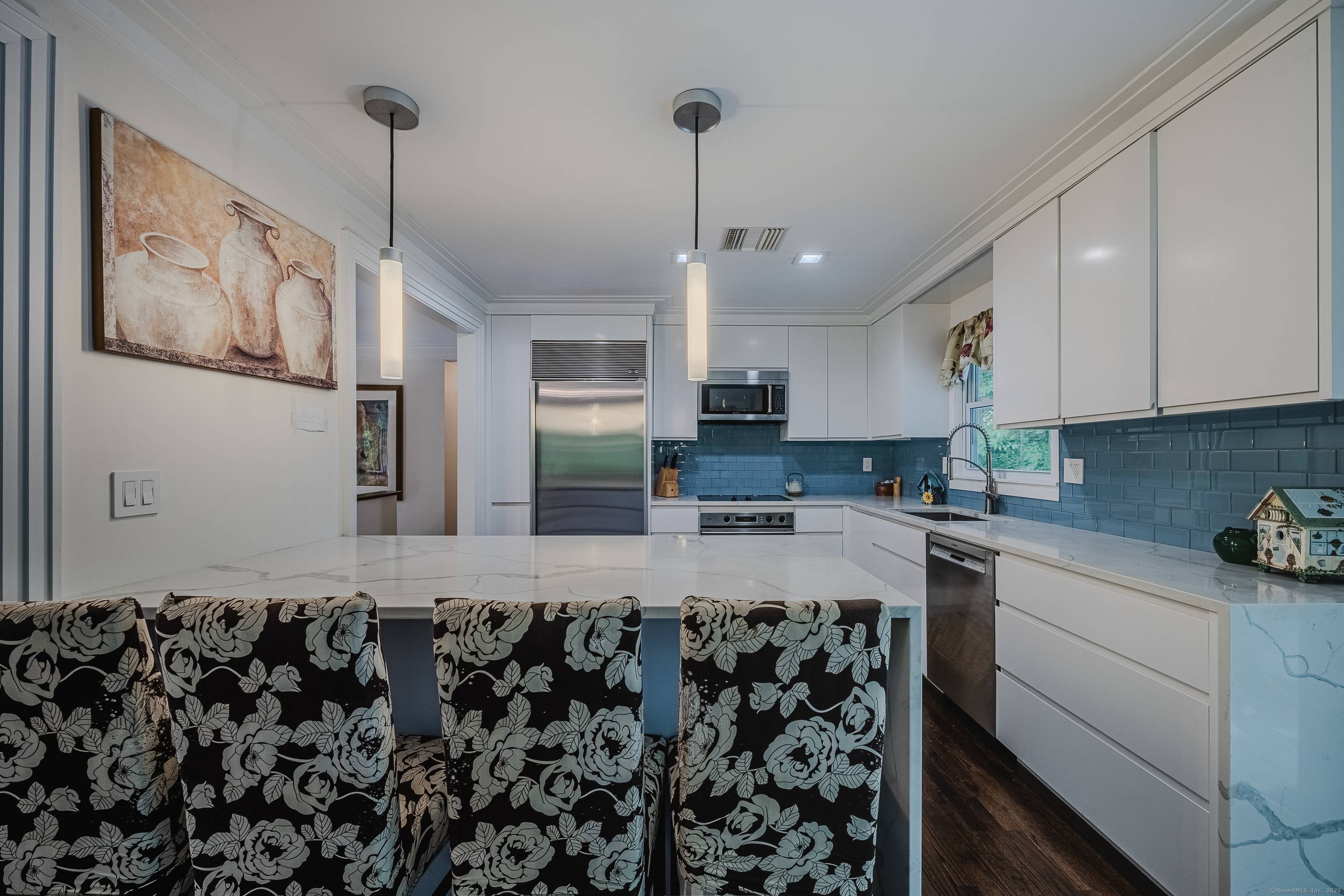 Prepare to be impressed by this beautifully remodeled 3 bedroom, 3 bathroom raised ranch, thoughtfully designed with luxurious details and exceptional craftsmanship.