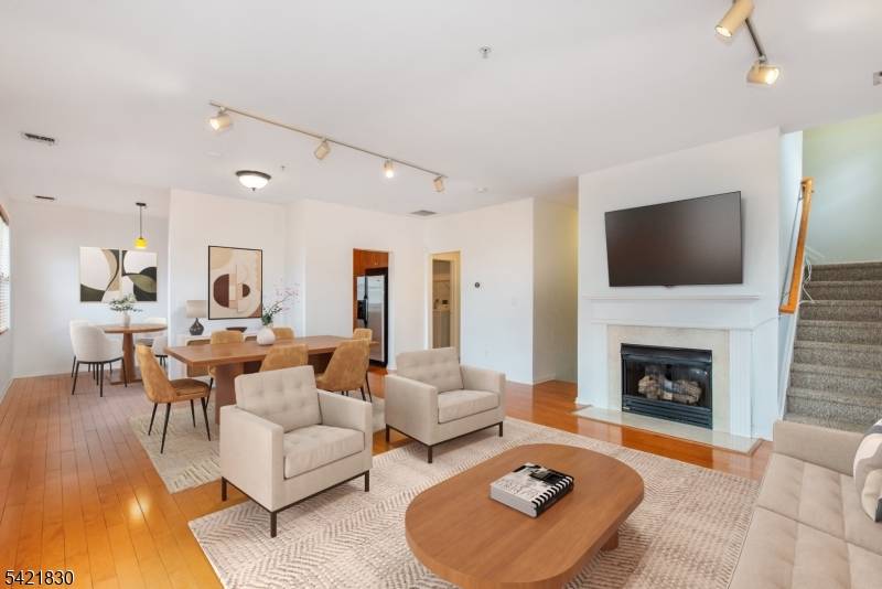 Stunning end unit multi level townhome one of the largest in Cambridge Crossings.