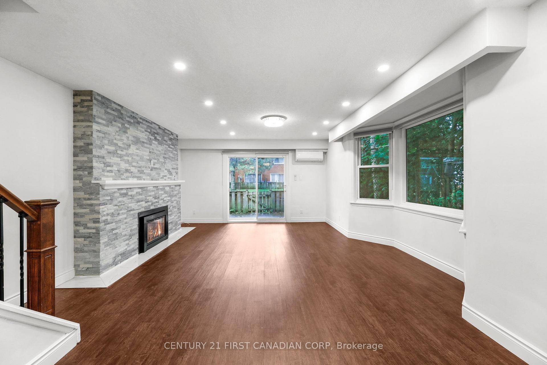 Beautifully renovated end unit townhouse offers bright, open living with stylish upgrades throughout.