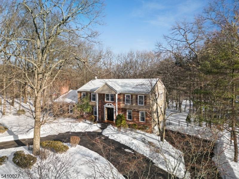 Nestled on a quiet cul de sac in the highly sought after Borough of Kinnelon, this home presents an impeccably maintained center hall Colonial set on a stunning 1.