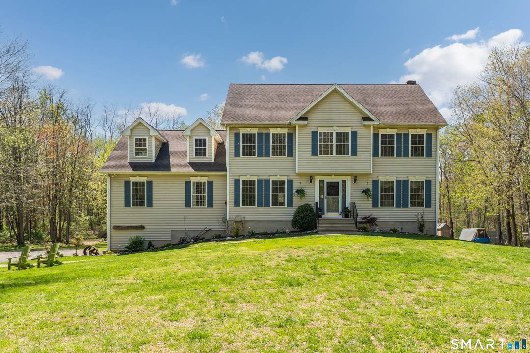 Amazing colonial on over 2 acres in the lovely country setting of Haddam.