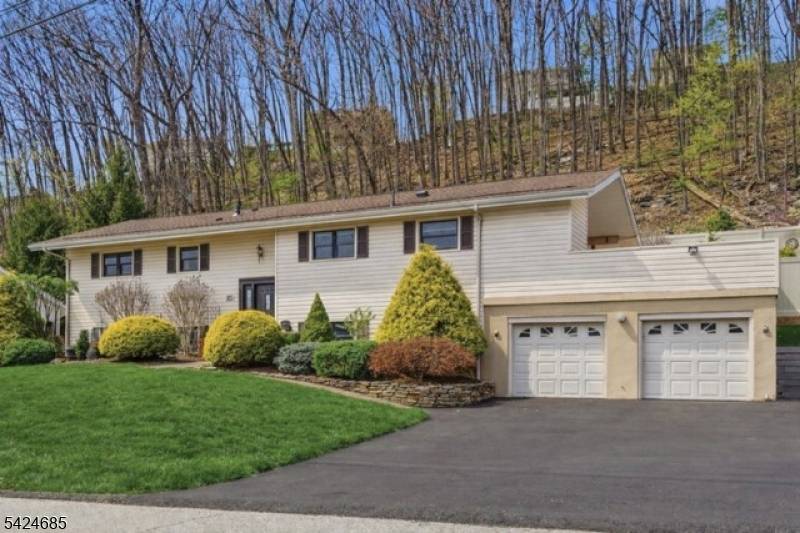 Welcome to this beautifully maintained home in desirable Rockaway Township, offering exceptional space, versatility, and comfort for today ?