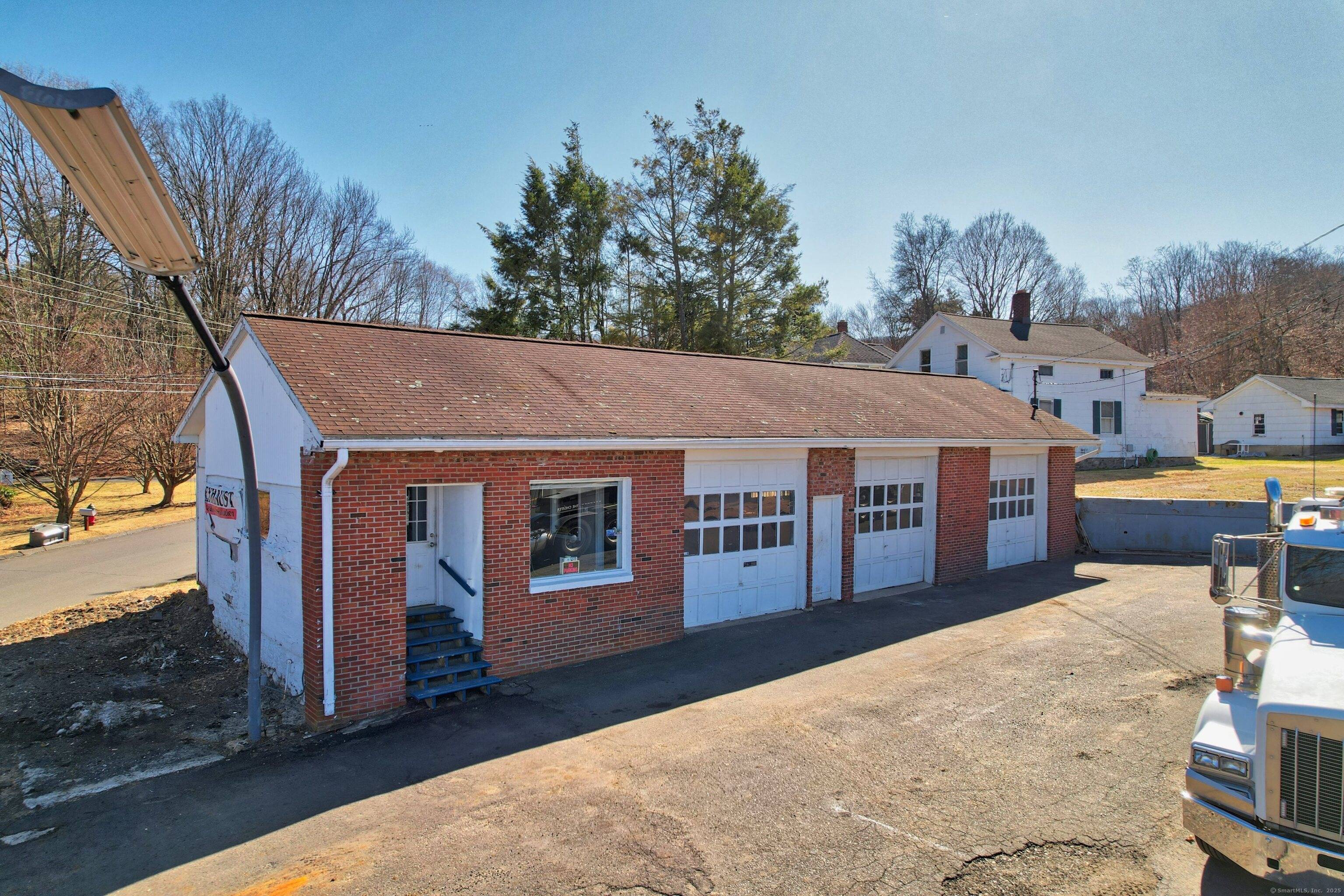 Prime Commercial Property with Service Garage Single Family Residence on Route 69 Discover a unique investment opportunity with this versatile commercial property, ideally located on high traffic Route 69.