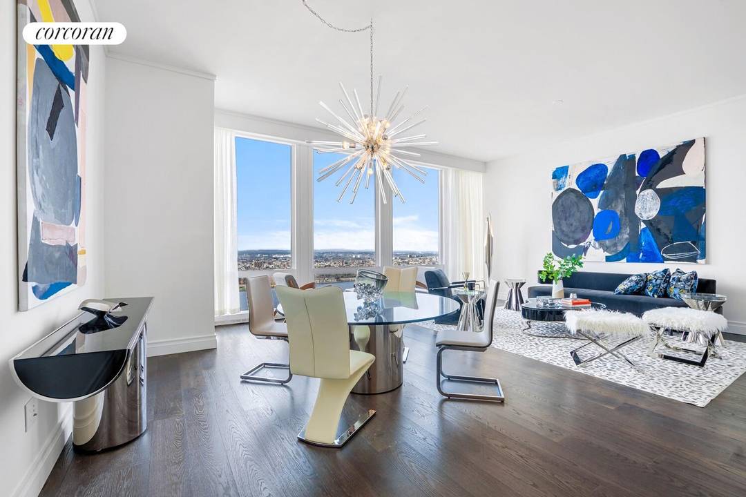 EXPERIENCE SPECTACULAR VIEWS OF THE HUDSON RIVER FROM THIS GRACIOUS CORNER TWO BEDROOM HOME.