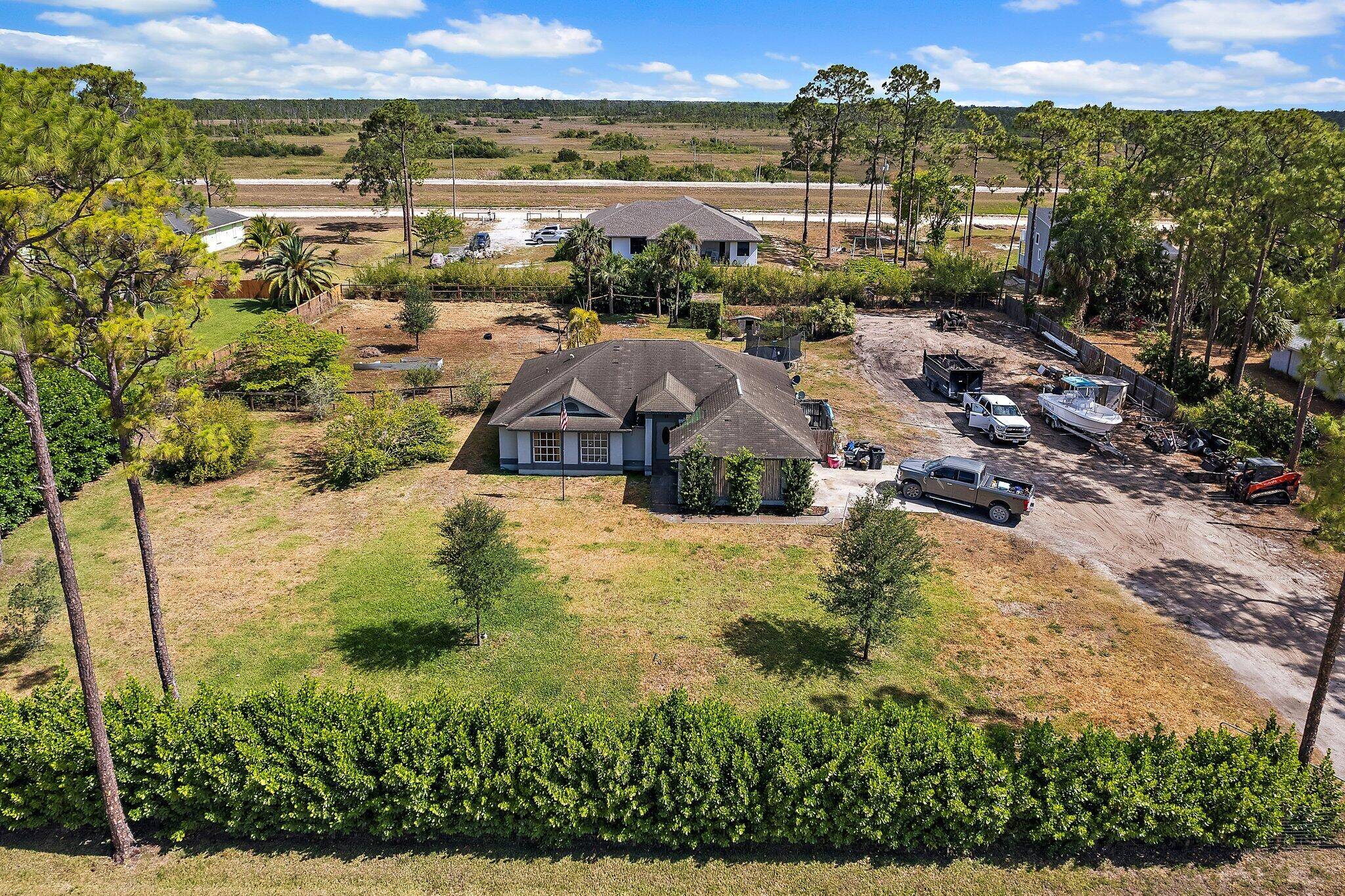 Rare chance to own a solid 3 bedroom, 2 bath, CBS home with 2 car garage on a spacious 1.