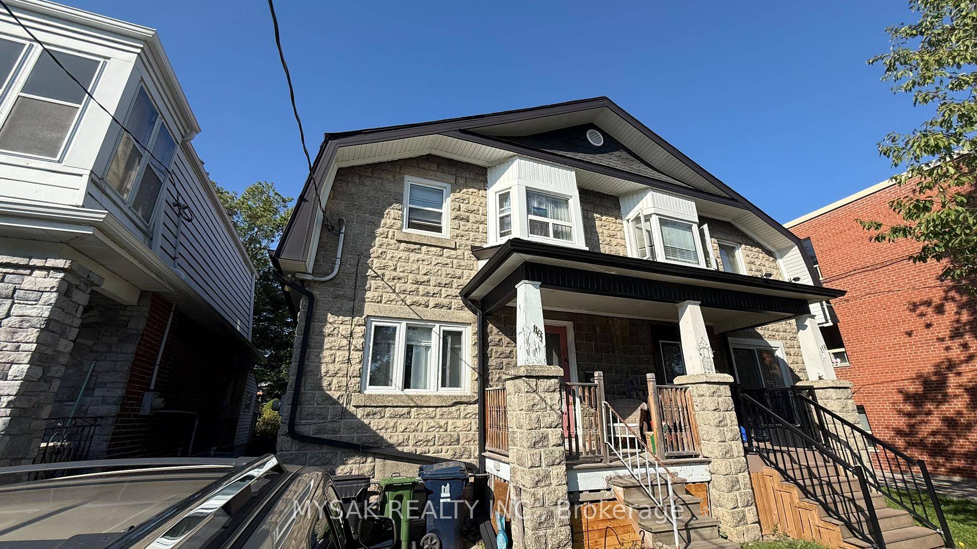 Rare Opportunity To Own A Semi Detached Triplex located In The Heart Of Lakeshore Village.