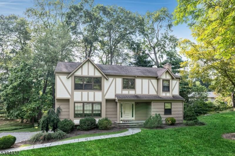 Live the good life in this stunning Center Hall Colonial, perfectly set on a quiet cul de sac in desirable Morris Township.