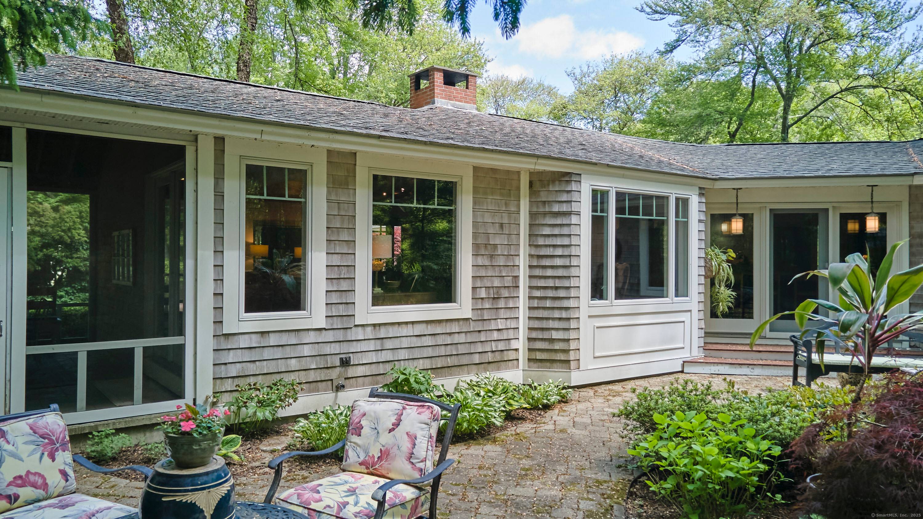 This marvelous single level house is nestled nicely on 1.