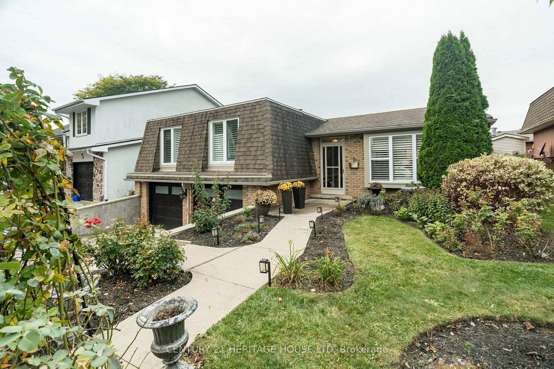 Welcome to 5 Beechwood Avenue, Brantford a beautifully remodeled three level side split that combines comfort, quality, and modern design.