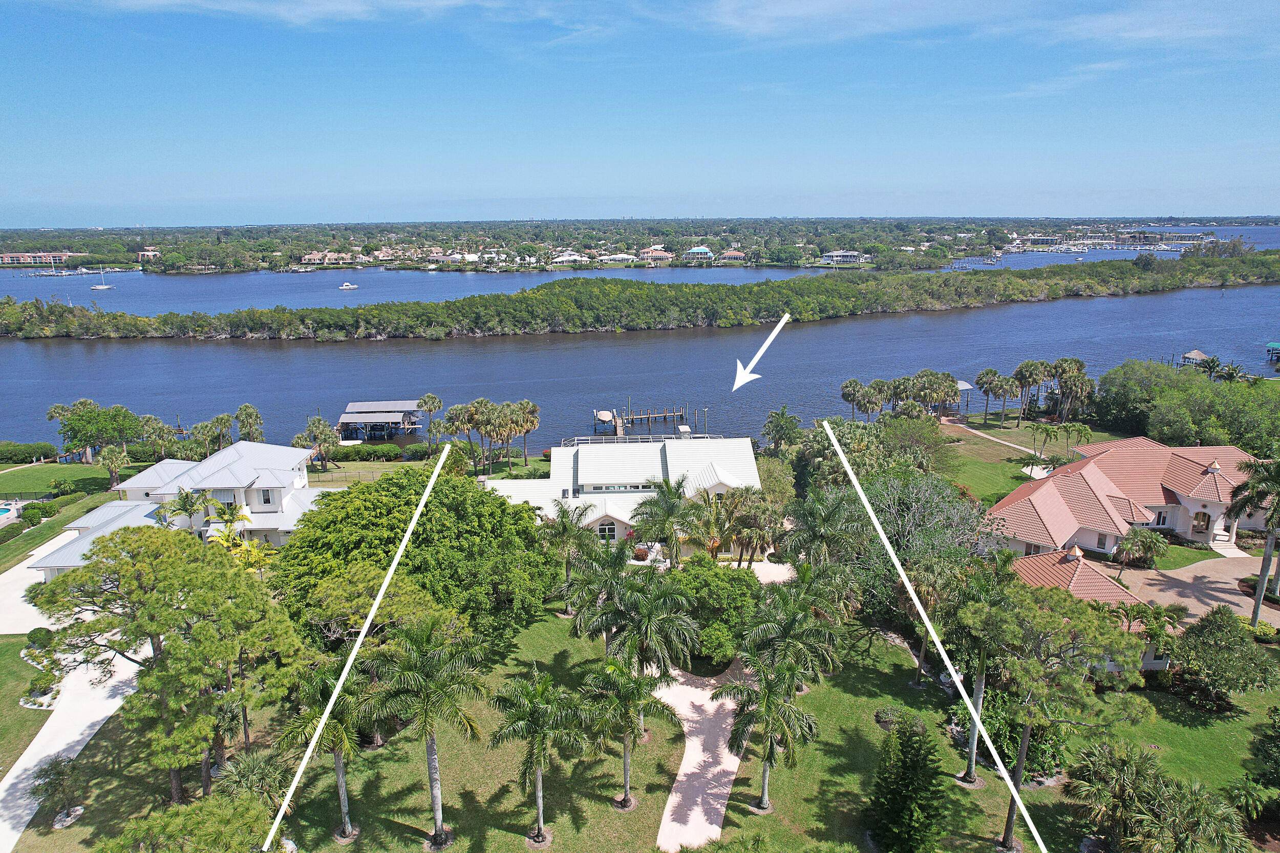Find your custom built waterfront home here with 150ft on the river sweeping views of the North Fork in beautiful Bay St Lucie !