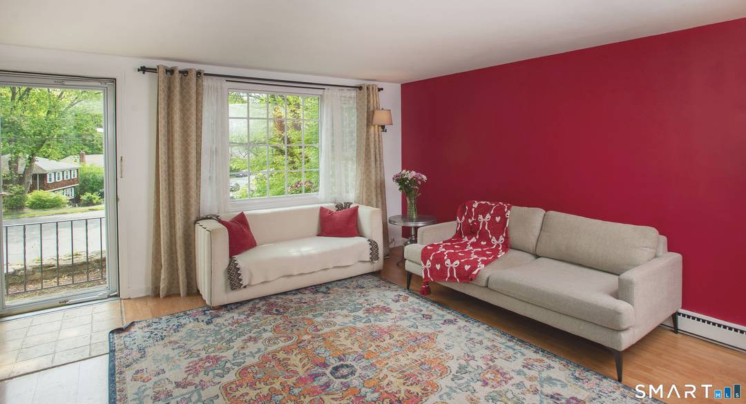 Tucked at the end of a quiet cul de sac, this bright 2 bedroom, 1.
