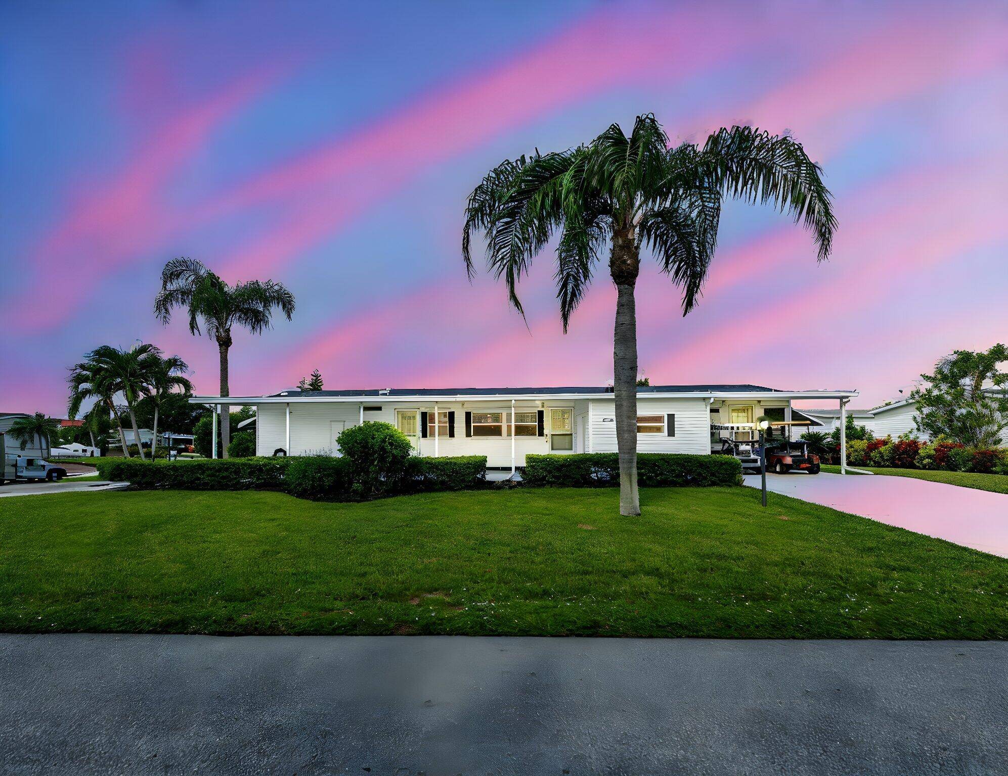 LAND OWNED ! Spacious corner lot in a 55 Community.