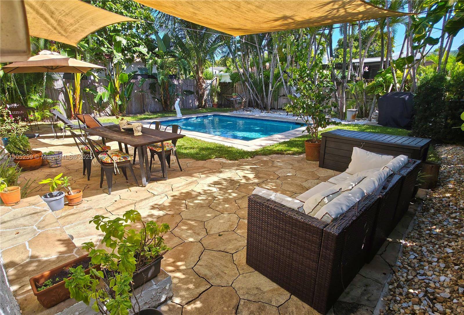 This stunning 4 bedroom, 3 bathroom gem is located in the trendy Isle of Normandy Miami Beach Step into a sunlit, open concept oasis blending elegance and tropical charm.