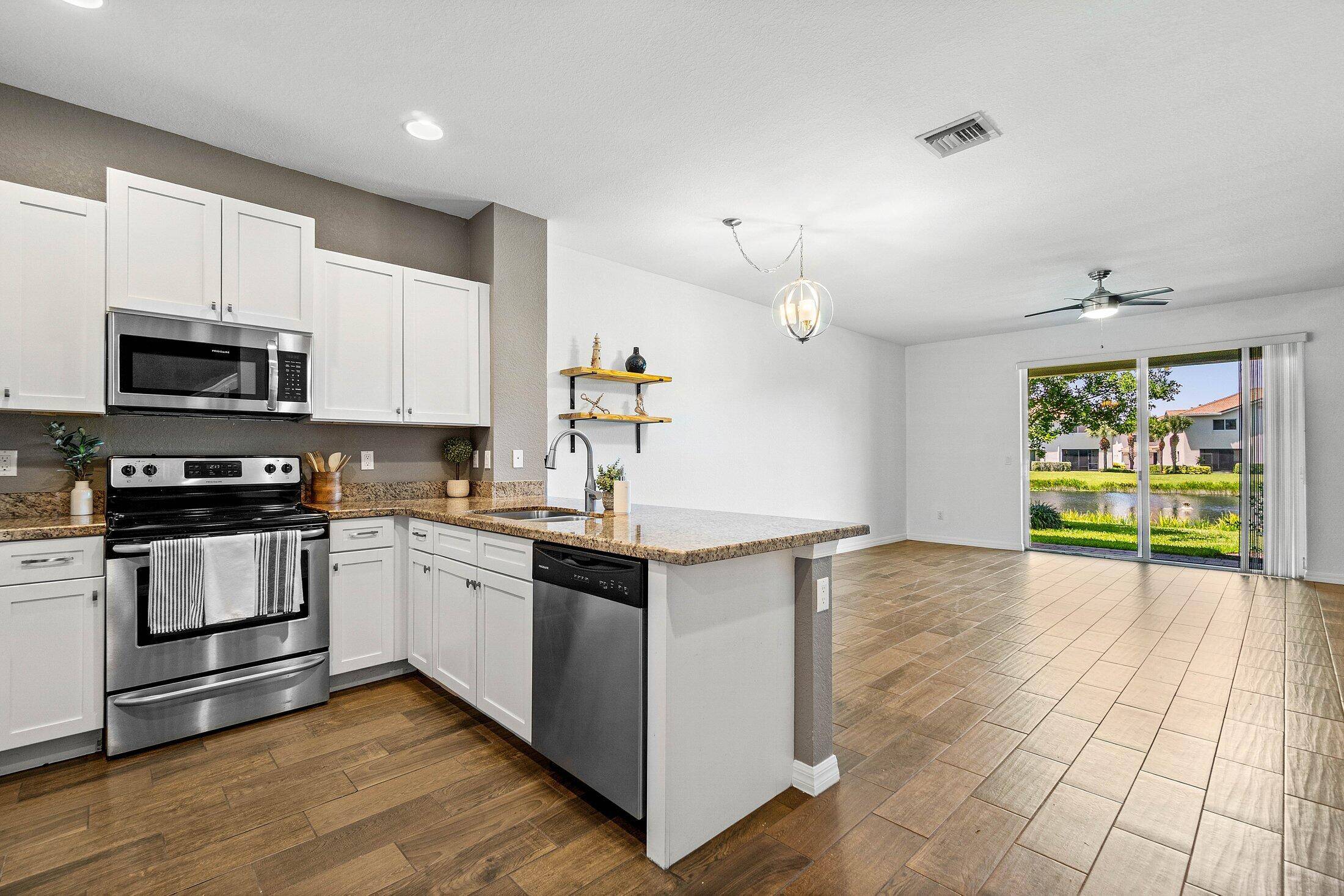 Welcome to this stylish waterfront home, built by D.