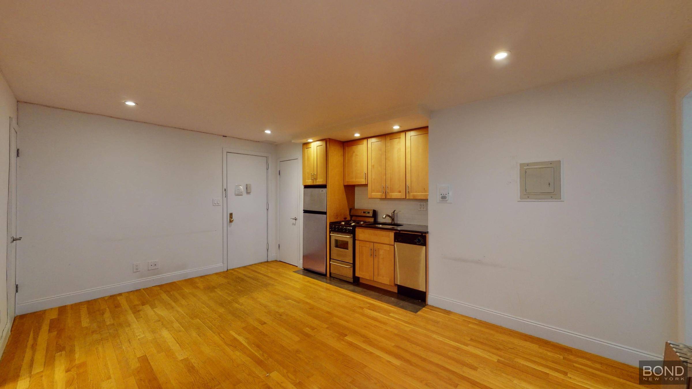 Renovated 1 bedroom apartment features spacious living room, an open kitchen with stainless steel appliances and a dishwasher, queen size bedroom, hardwood floor and high ceilings.