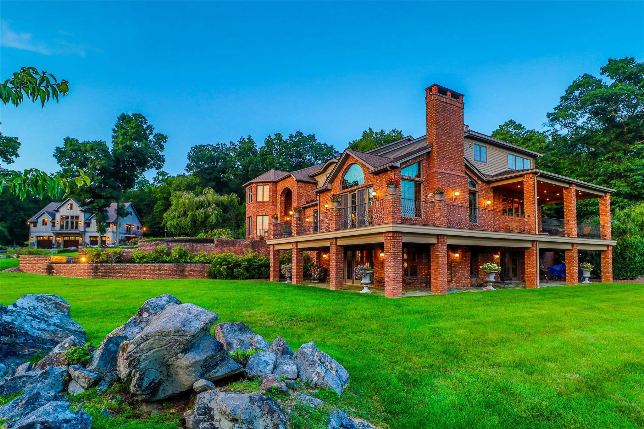 An exquisite country estate nestled on over 15 acres of gated privacy with stunning mountain views.