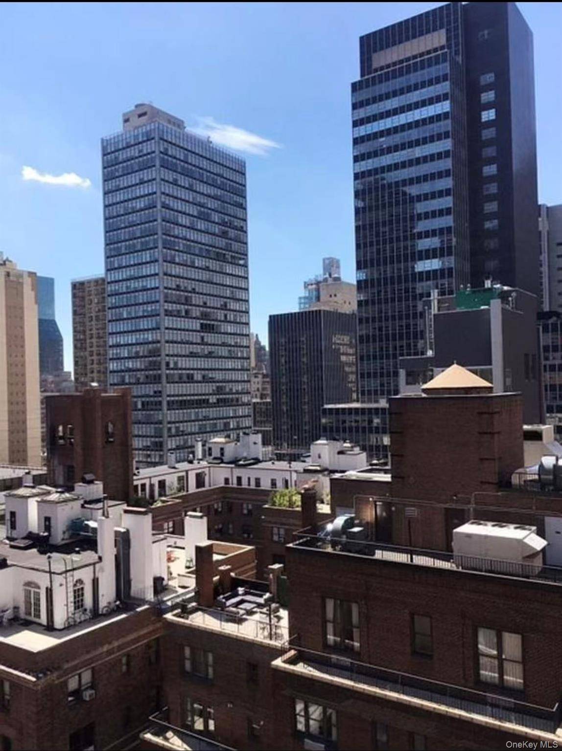 Residence 22C is south facing large one bedroom with bay windows.