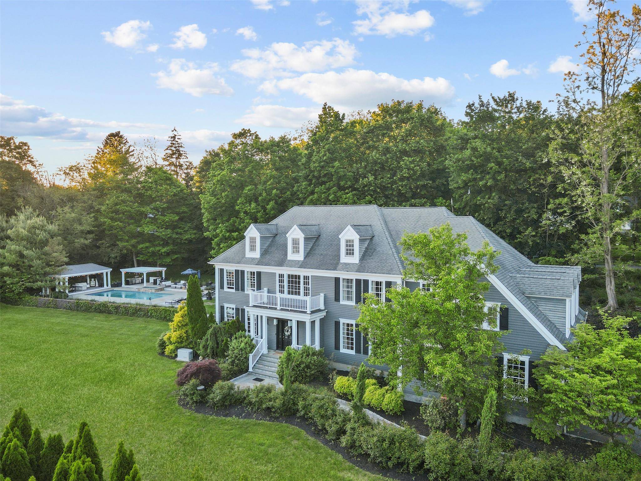 This meticulously designed Colonial in the prestigious Chappaqua Central School District provides a true haven for those who appreciate refined living with a contemporary turnkey design aesthetic.