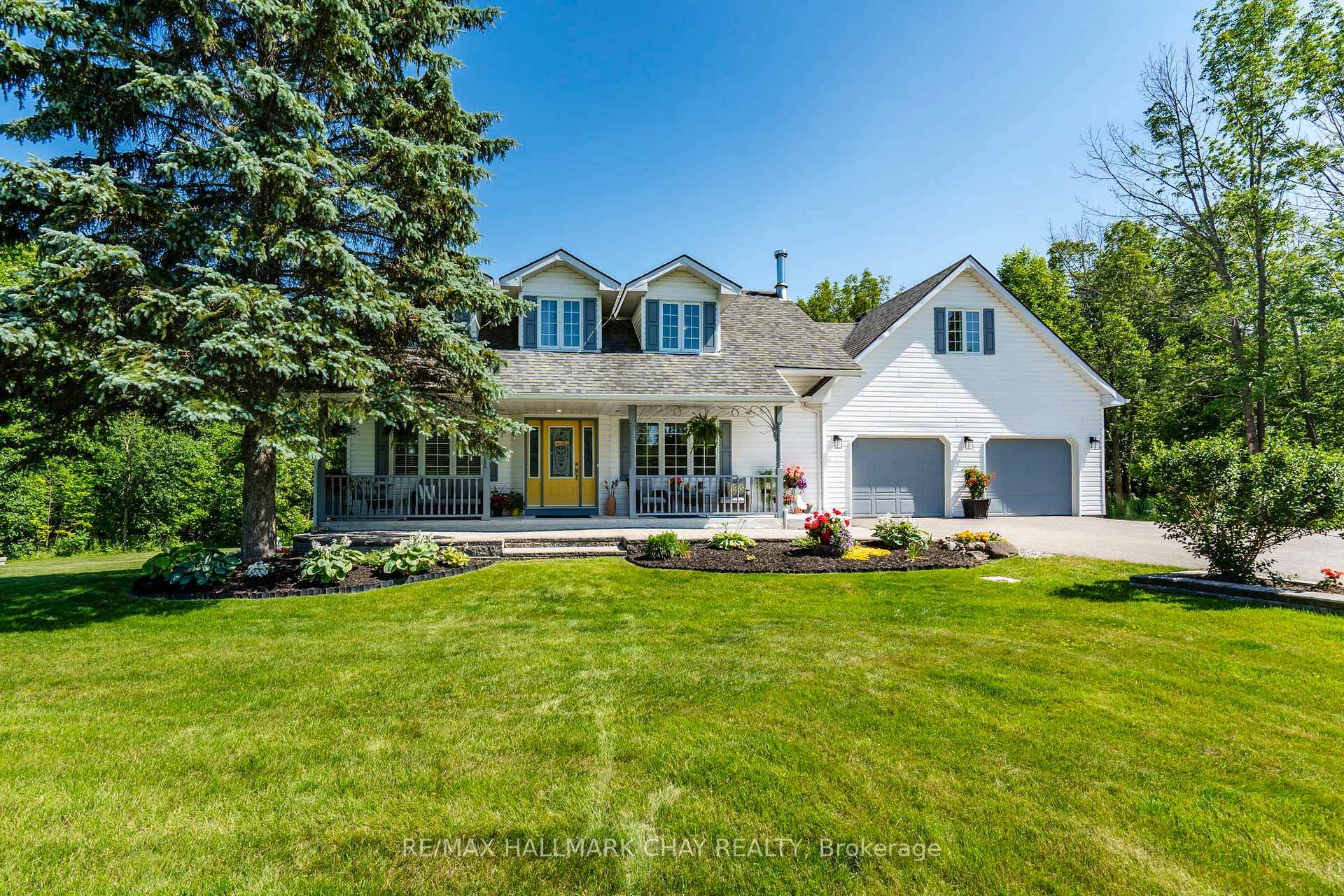 Set on a picturesque 7. 7 acre lot at the edge of Moonstone, this updated Cape Cod style home blends charm, space, and versatility.