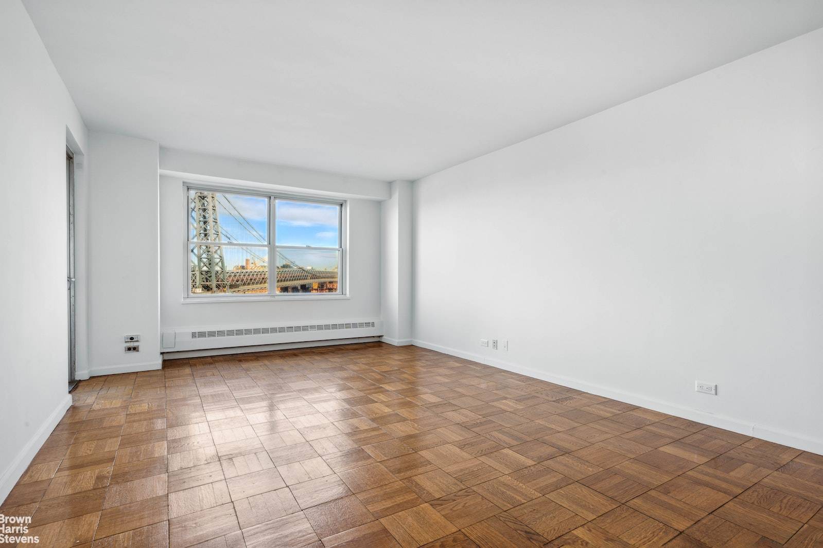 Renovated high floor, 1BR Balcony apartment featuring beautiful sunrises and fantastic views of the East River amp ; Williamsburg Bridge all year round !