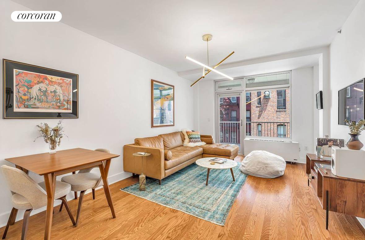 Walk into unit 3N at 62 East 1st and you'll immediately ve greeted by beautiful finishes, a perfect layout, and a huge terrace.