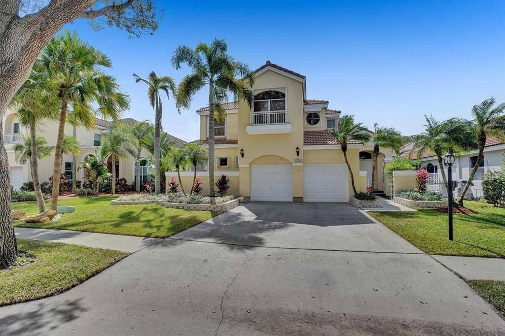 WELCOME TO PARADISE IN THE GATED COMMUNITY EMBASSY LAKES AT COOPER CITY.