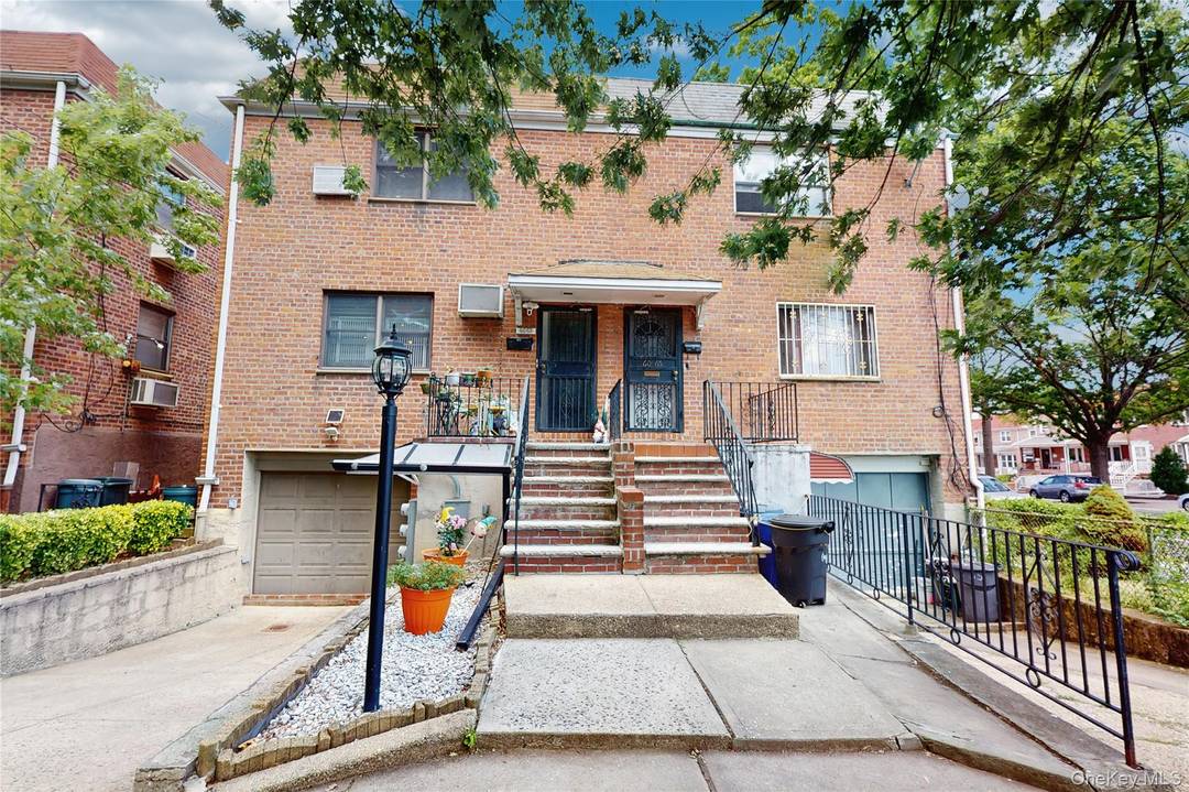 Classic And Beautiful Two Family Brick Home In The North Of Middle Village Offers The Perfect Combination Of Space, Comfort, And Convenience.