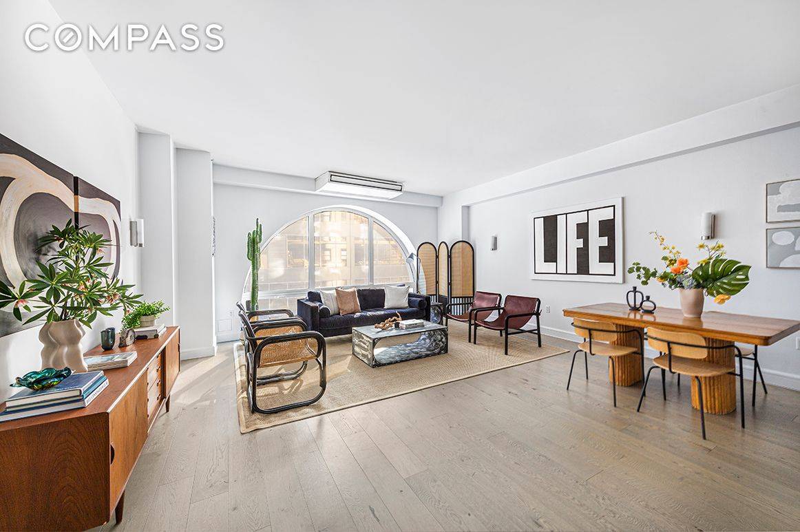 Beautifully renovated 2 bed, 2 bath loft in the thriving Financial District with Tribeca just a few short blocks away.