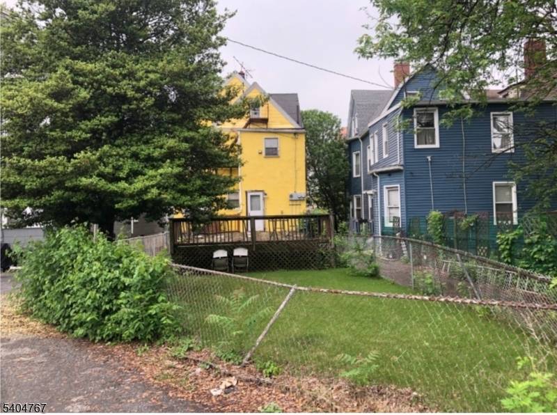 This Classic 2 Family has beautiful natural wood, hardwood floors, 2 furnaces separate electric, 3 car garage.