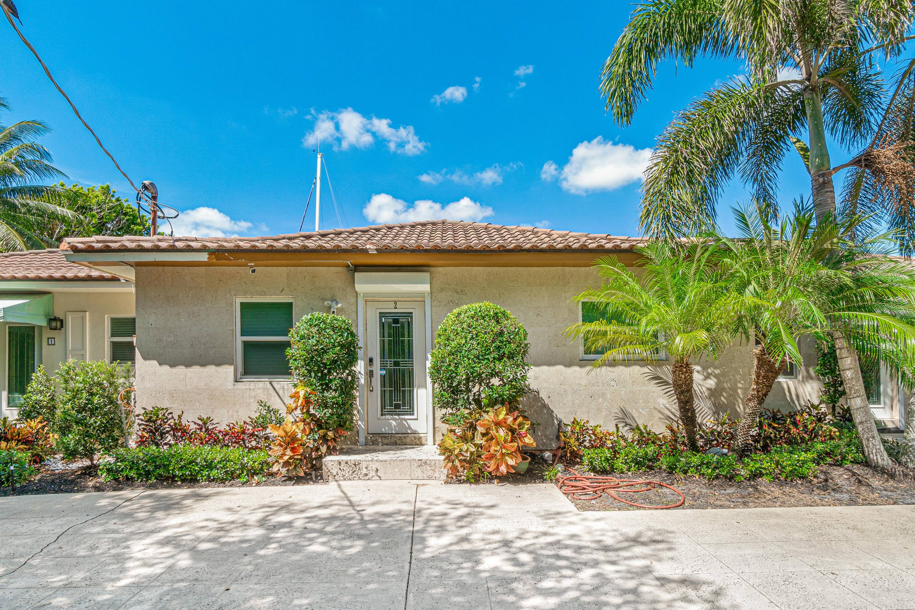 This inviting waterfront villa is now available for annual rent.