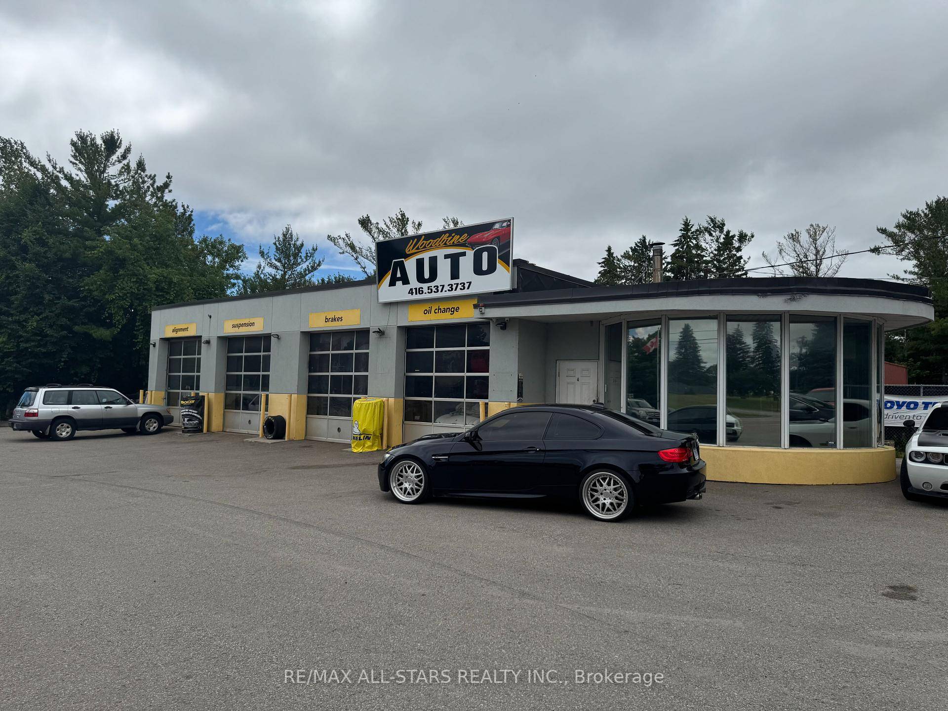 Located at 14806 Woodbine Avenue in Whitchurch Stouffville, this 4 bay mechanic shop offers a fantastic opportunity on a spacious.