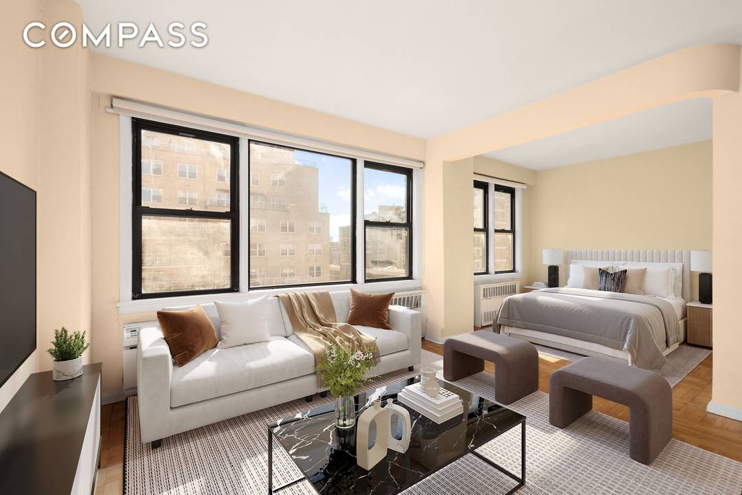 Perched high above the city on the 16th floor, this bright and spacious alcove studio at 245 East 24th Street is flooded with stunning eastern light all day long.
