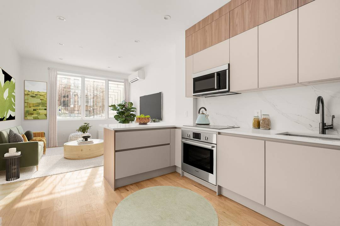 Welcome to 187 Pulaski Street, Unit 1, a thoughtfully designed garden duplex offering refined custom finishes, exceptional indoor outdoor living, and a flexible layout rarely found in boutique condominium living.