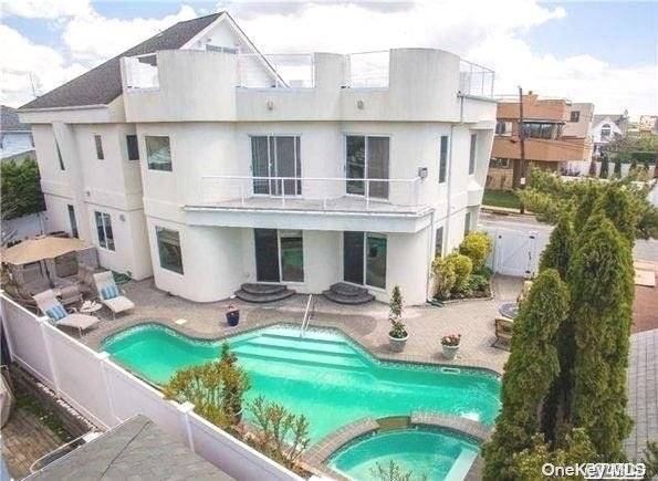 Beach House with Oceanview s steps to private beach pool and hot tub patio private yard and roof top patio.