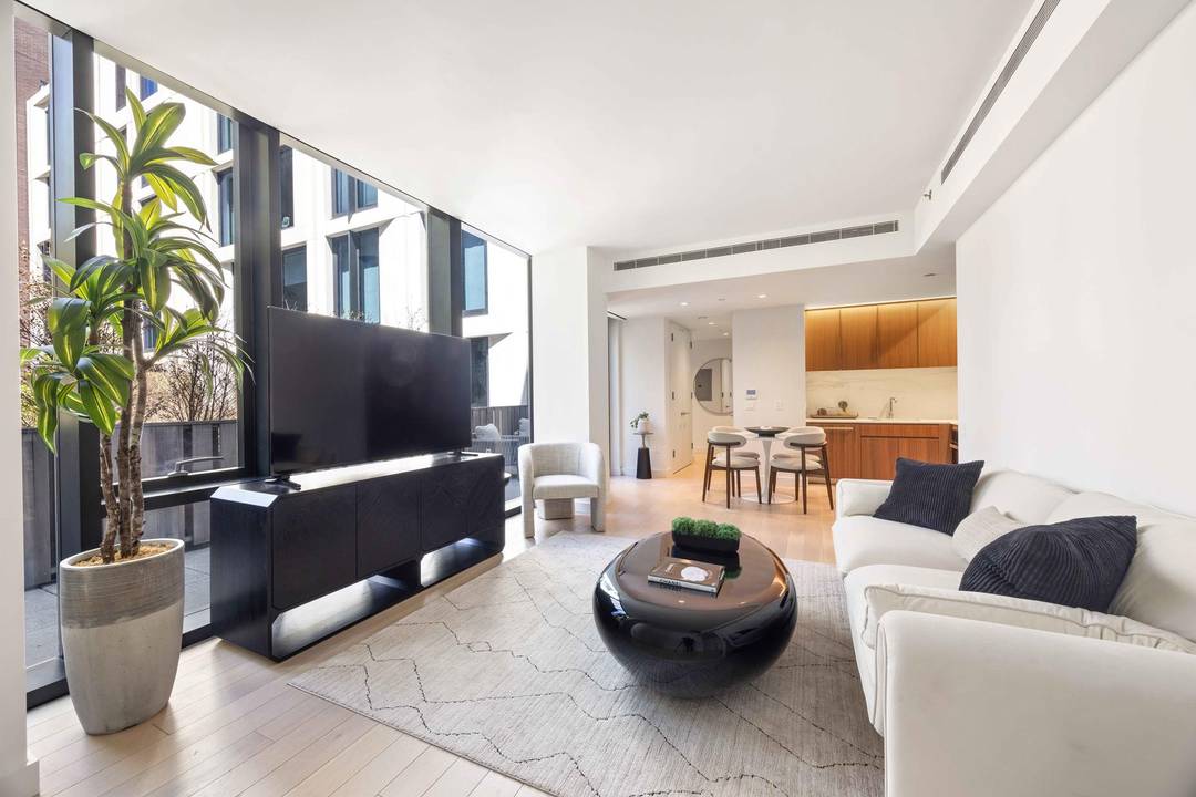 An Urban Retreat in Midtown West, Where Outdoor Living FlourishesIntroducing Unit 210 a two bedroom, two and a half bathroom home with an expansive private outdoor space running the entire ...