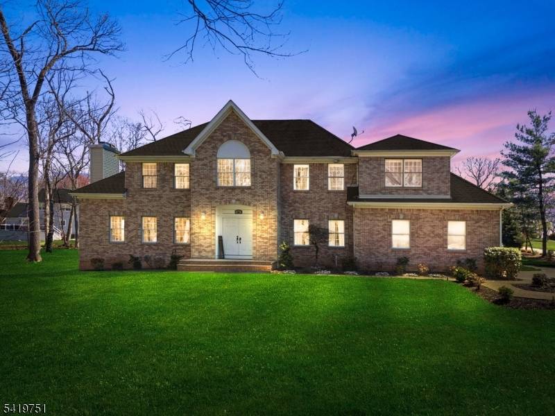 Set in Woodshire Estates, one of Montville's most desirable sections, this impressive 5 bedroom, 3.