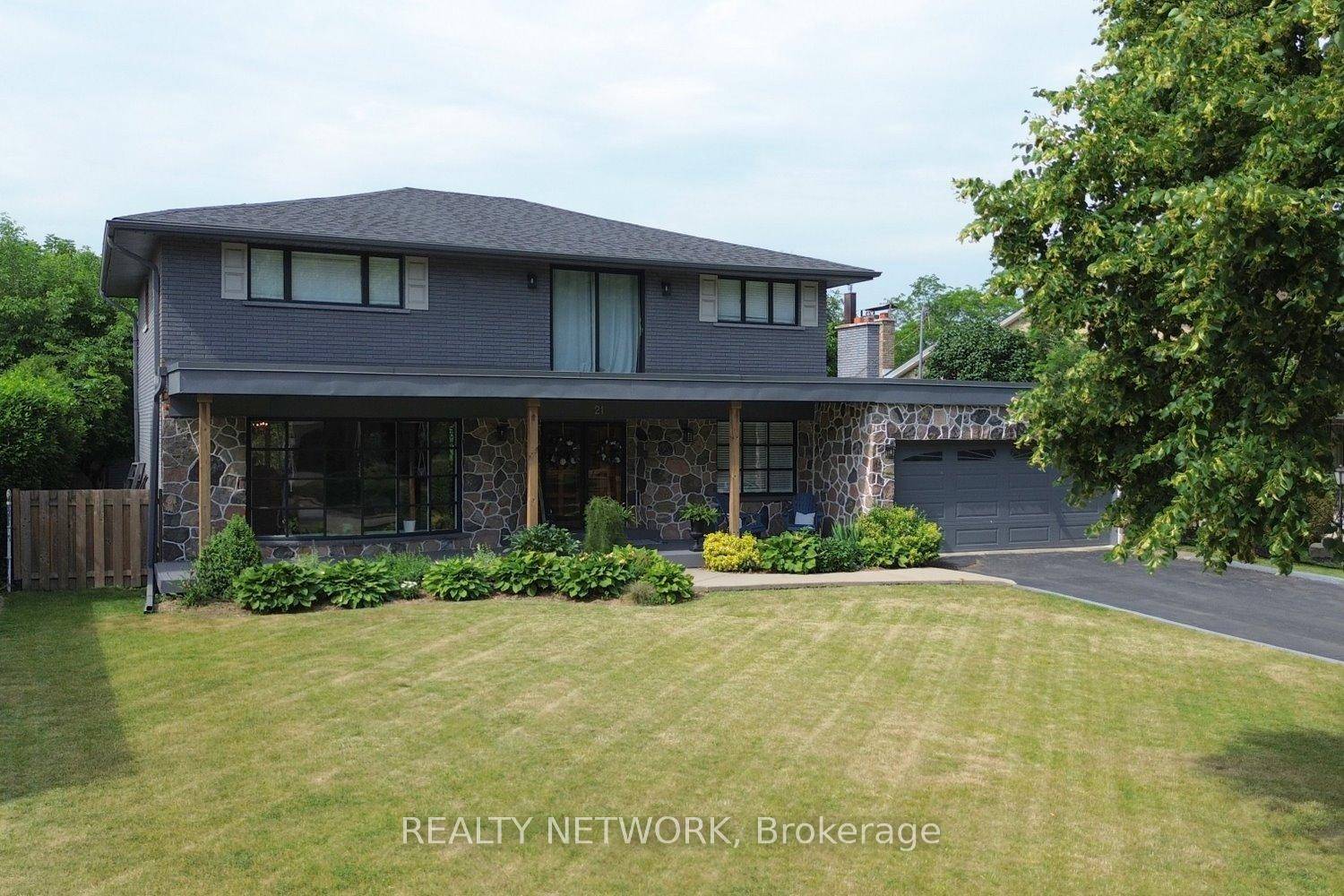 This beautiful custom built home is located in the prestigious Sherwood Heights neighborhood.