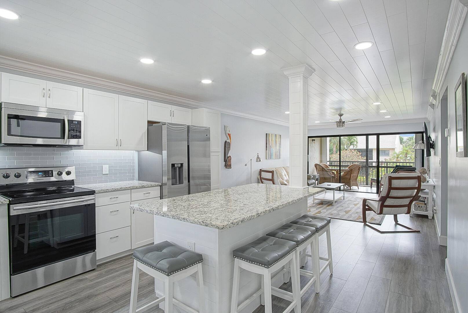 One of kind 2nd floor, 2 bedroom, 2 full bath unit, meticulously updated featuring shiplap ceilings and recessed lighting throughout, completely remodeled open kitchen, newer appliances, beautifully furnished in modern ...