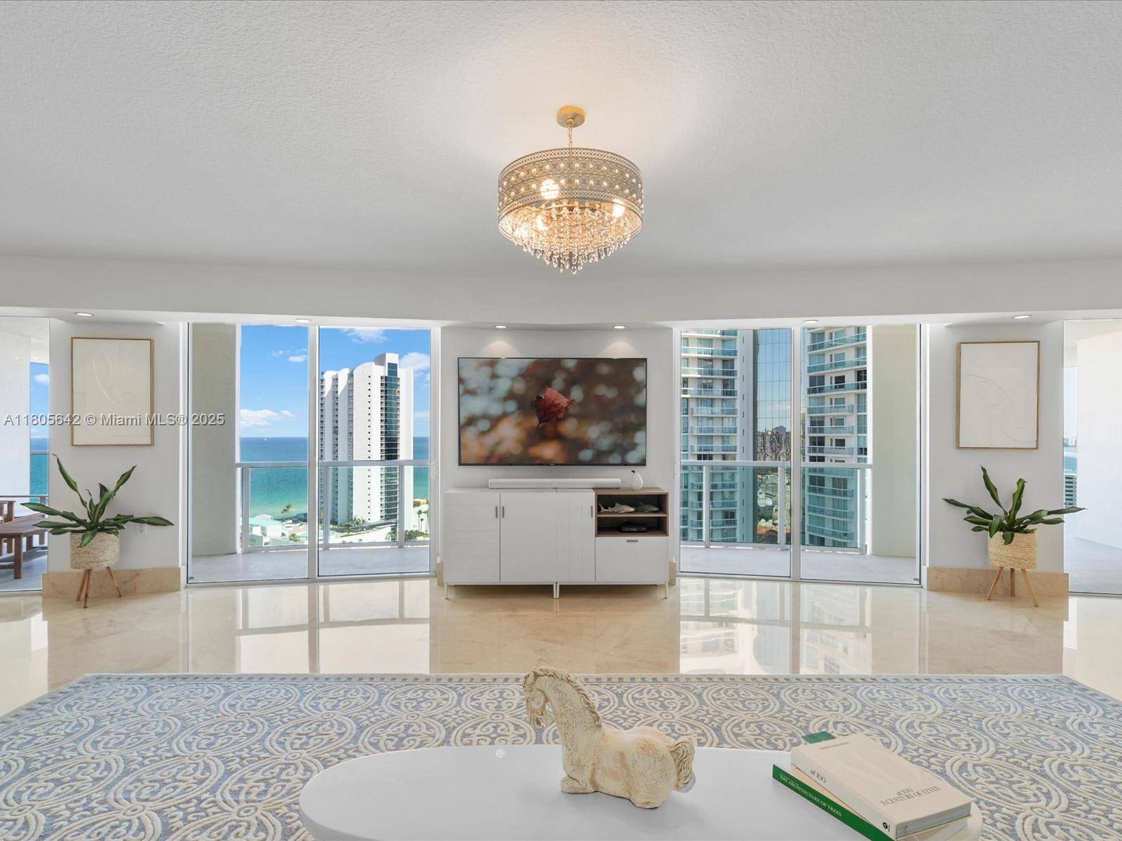 Coastal modernism welcomes you to this luminous penthouse spanning nearly 50 feet of direct ocean and Intracoastal frontage, culminating in a 600 sq ft sky framed terrace.