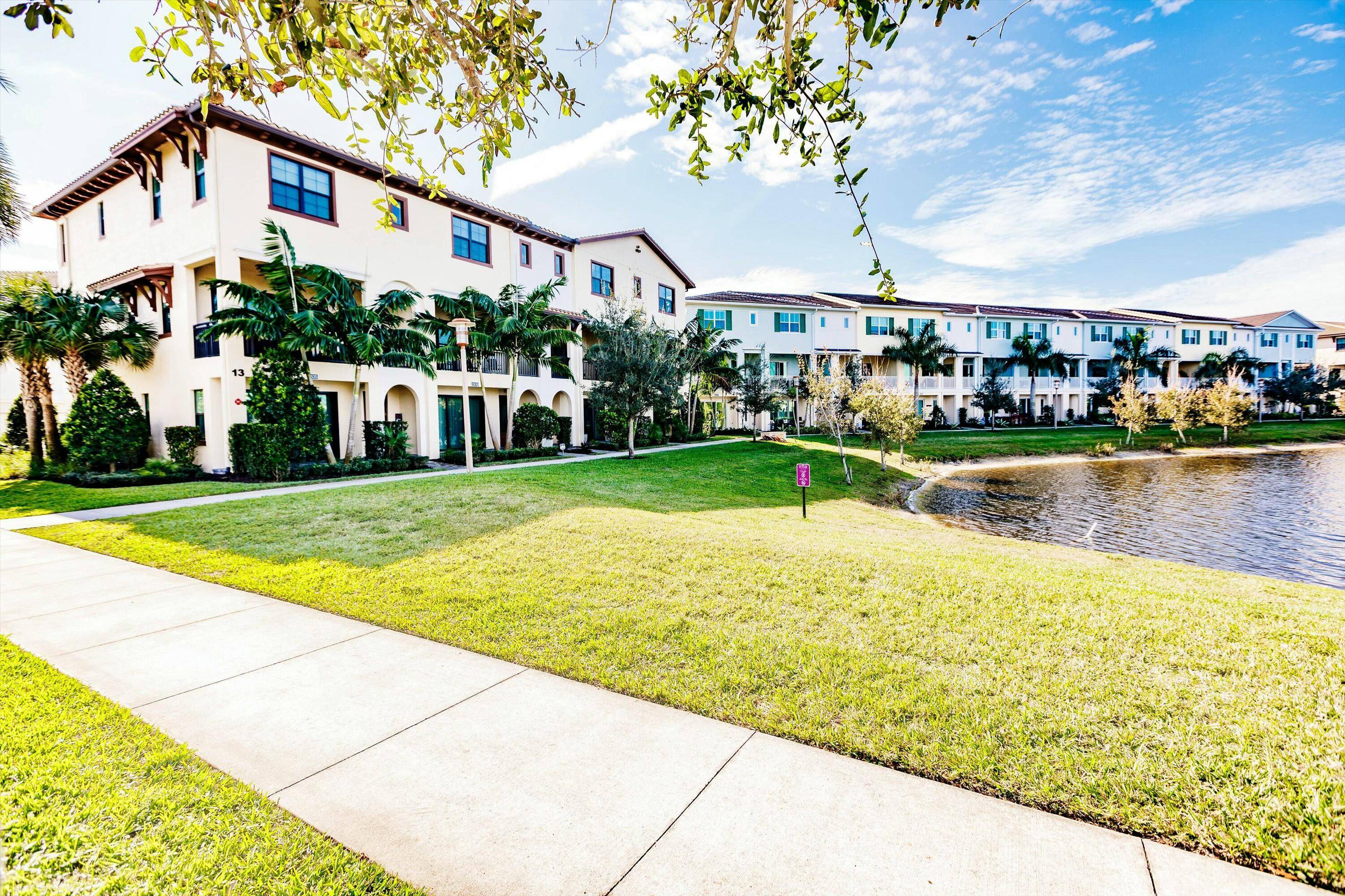 Welcome to this beautiful, 2023 built, lakefront townhome featuring 3 BED, 3.