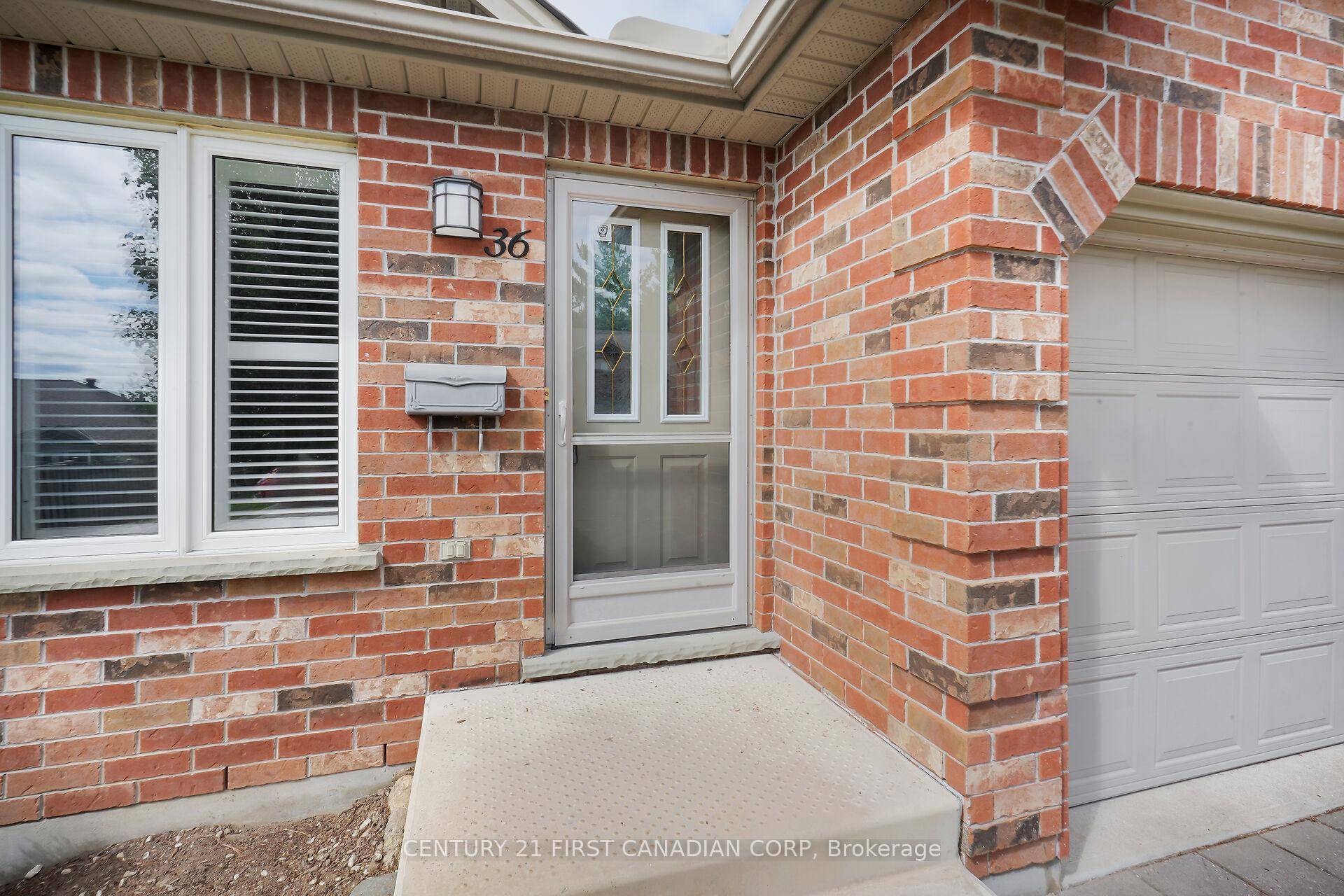OPEN HOUSE SUNDAY AUG 31st 2pm 4pm Welcome Home to this stunning bungalow townhome tucked away in a quiet, treed enclave in desirable Northwest London.