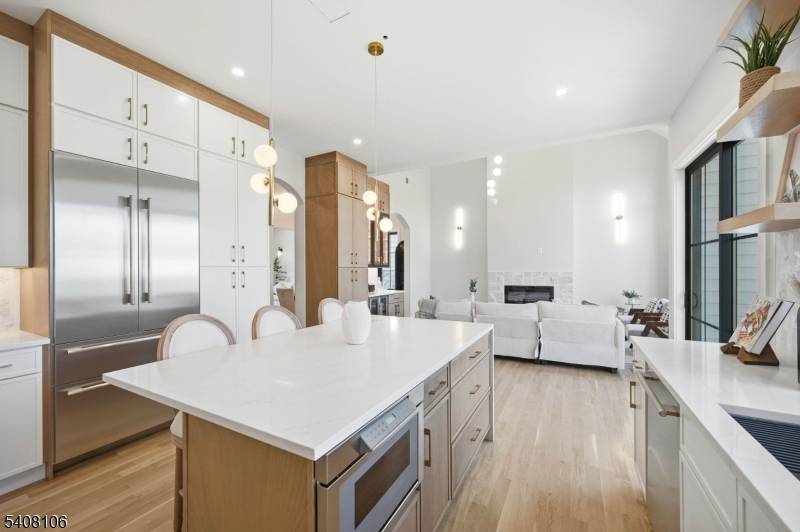 Set on a beautiful flat property in one of Livingston's most desirable neighborhoods, this exceptional new construction home offers the space, layout, character today's buyers are looking for.