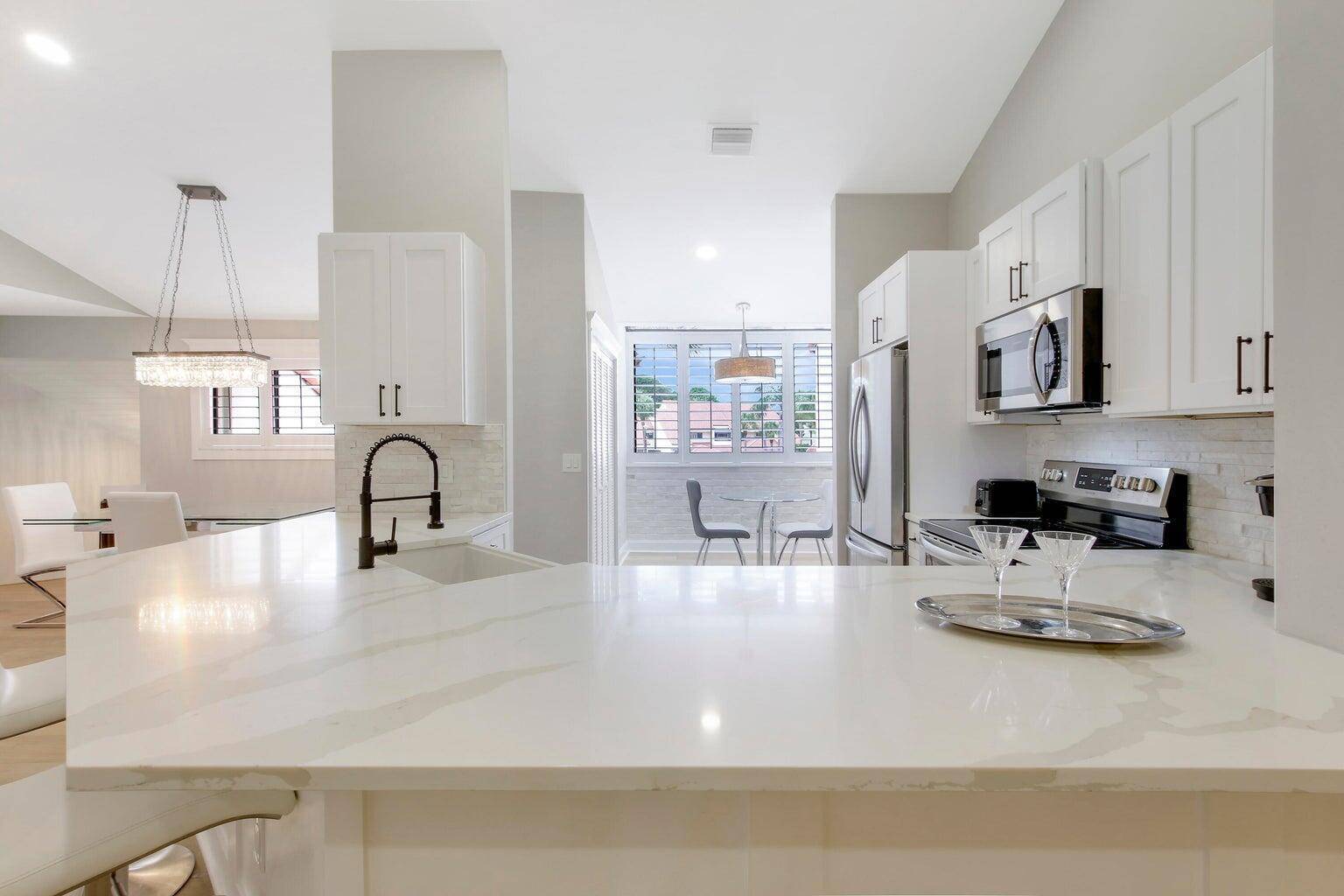 CHARMING COASTAL CONDO'' This is a genuine turnkey condition completely renovated unit with all high end touches.