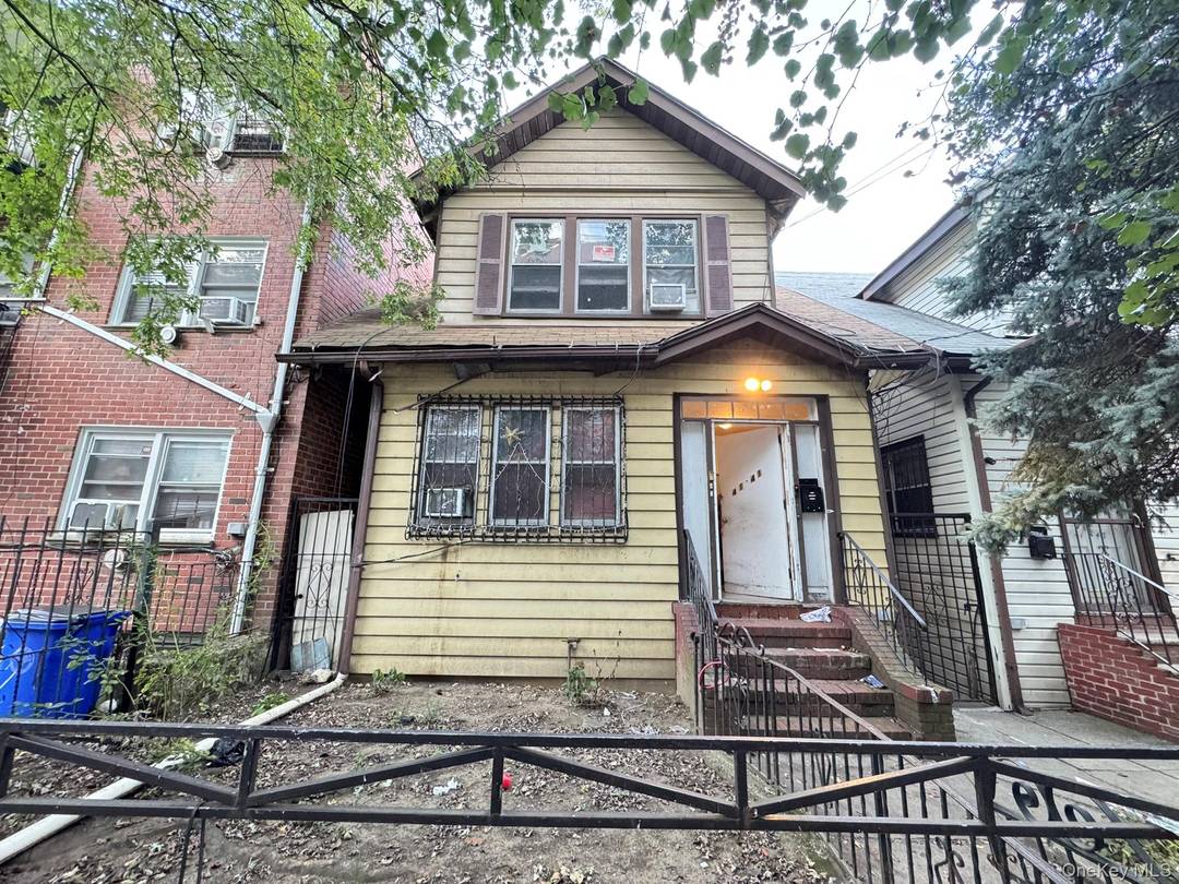 detached 2 family in Elmhurst.