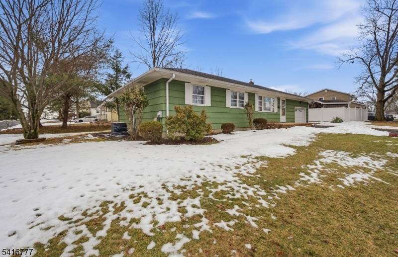 Charming, lovingly maintained 3 bedroom ranch with 2.