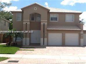 DORAL ISLES RIVERA 5 BEDROOMS, 3 FULL BATHROOM, 2 CAR GARAGE, ONE BEDROOM AND BATH FIRST FLOOR TOTALLY RENOVATED, CENTRALIZED INTERNET IN WHOLE HOUSE.