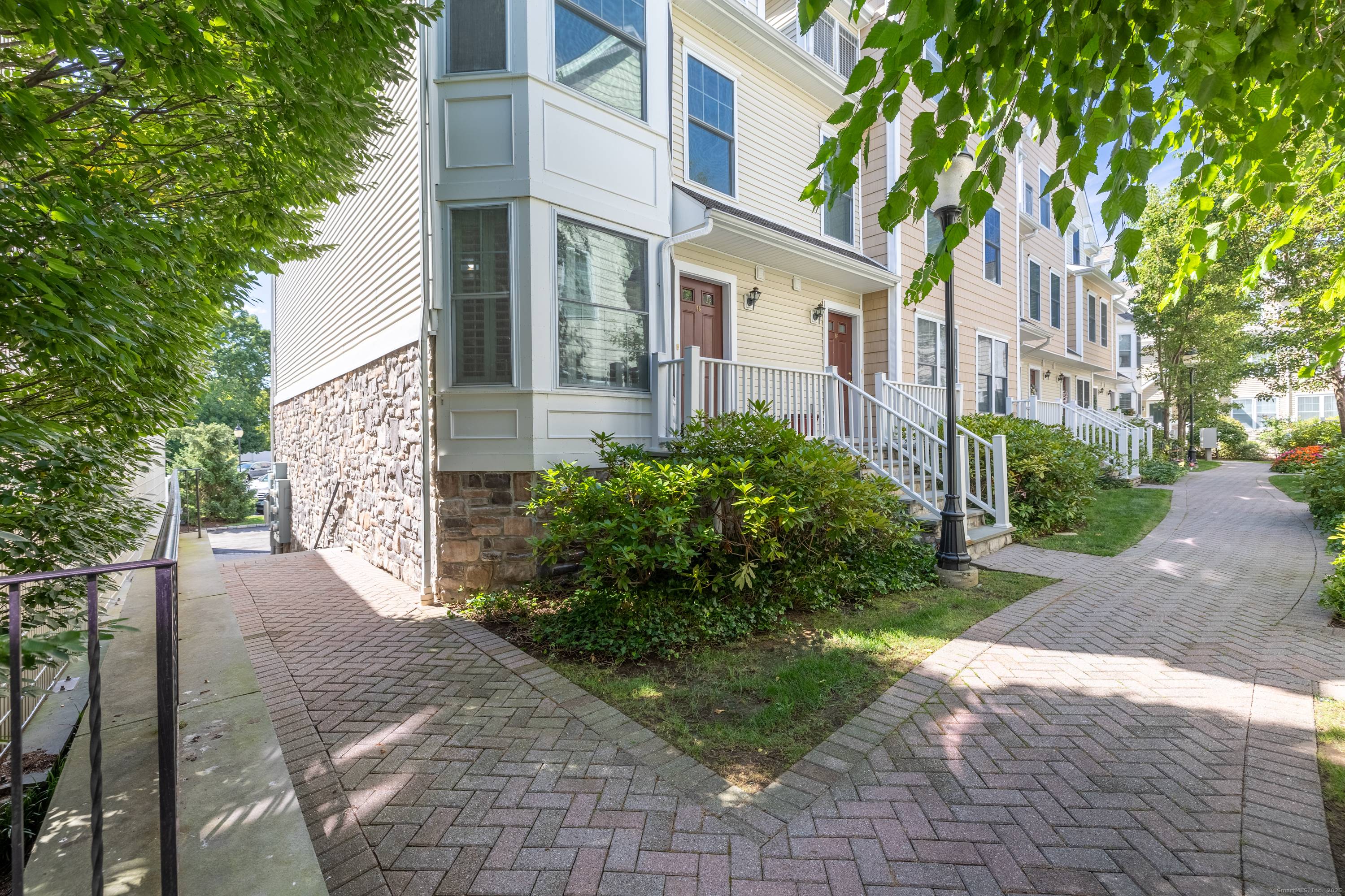 Welcome to River's Edge, Stamford's most desirable townhome community.